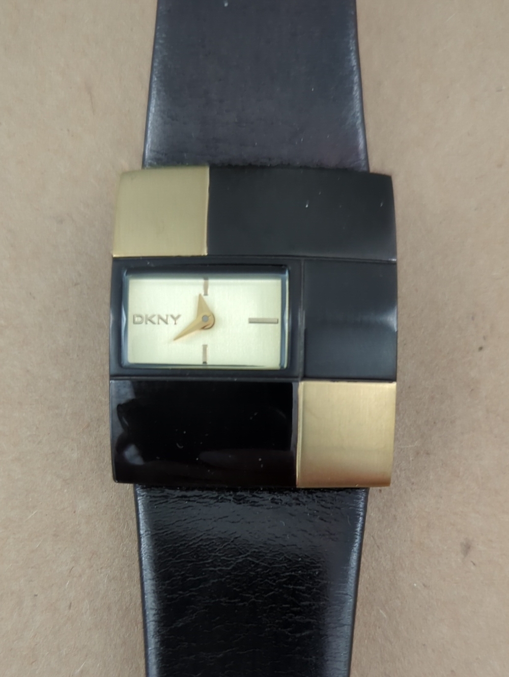 DKNY Black and Gold Geometric Women’s Watch